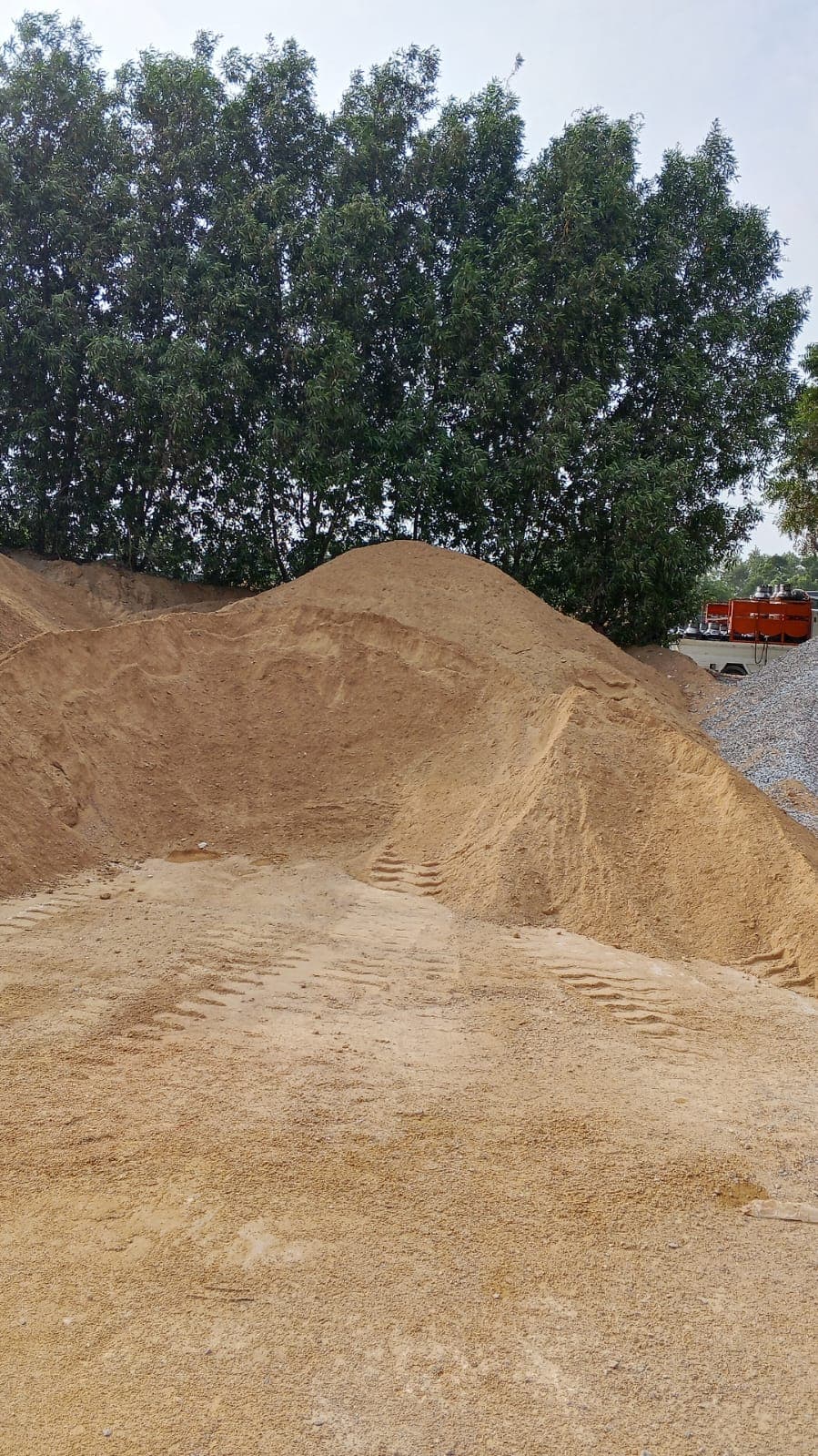 Sand stockpiles at the supplier yard